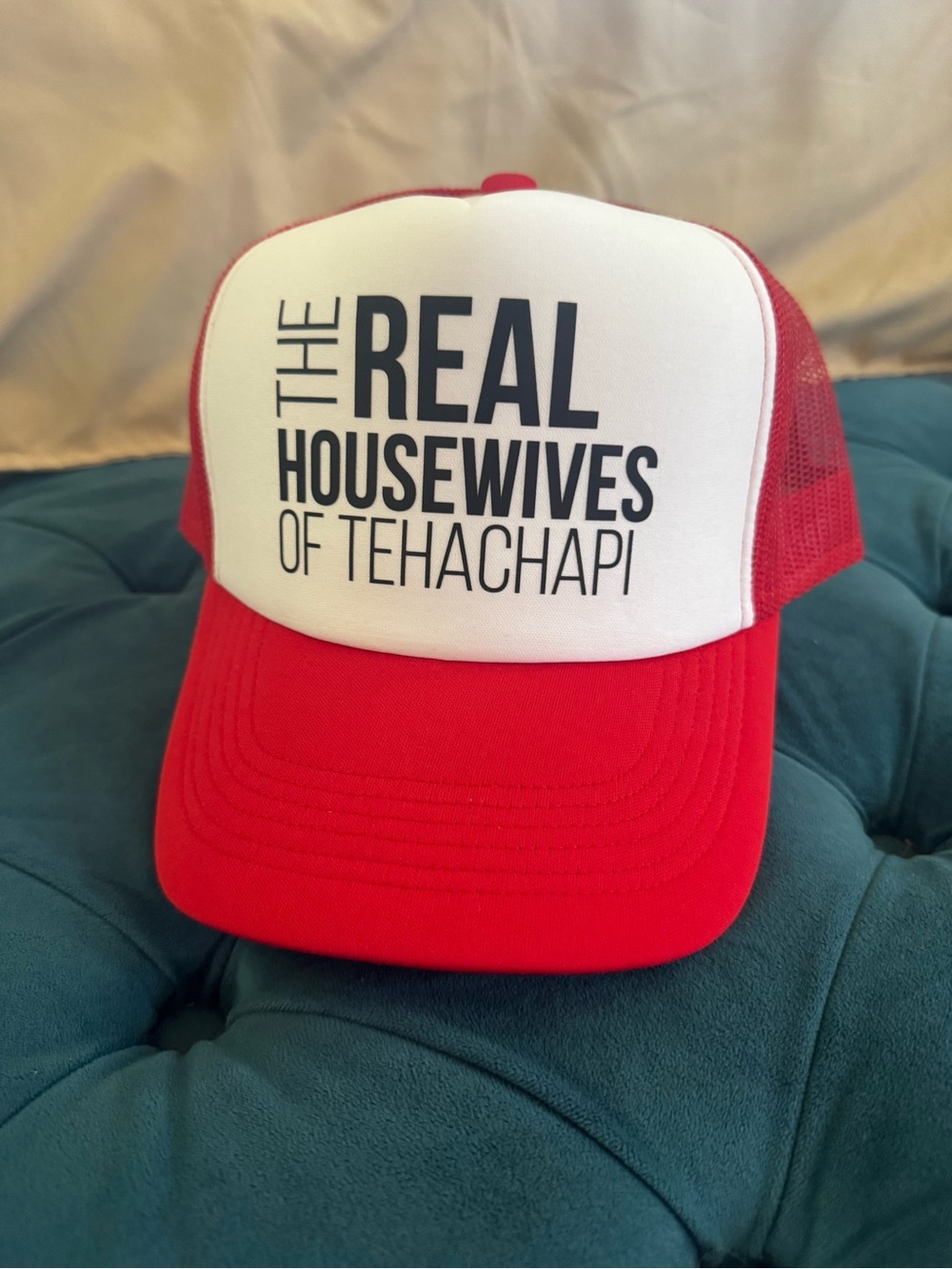 Real Housewives of Tehachapi Red and White Trucker Hat with Black Text